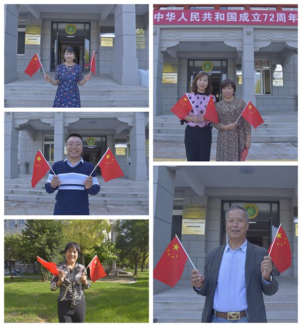 9c8e53e9801d456a851d28aad22f8d64.jpg 老师们与国旗合影.jpg